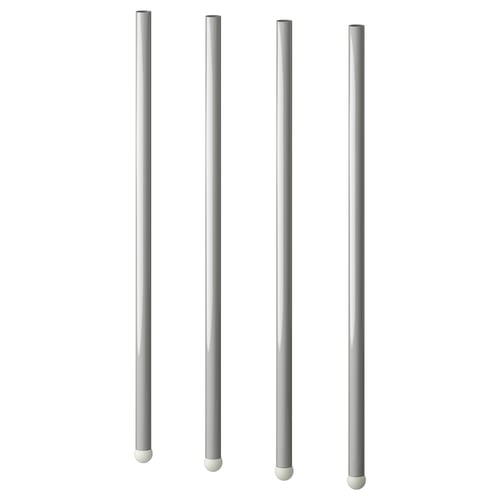 Four grey poles, cylindrical with round tips, evenly spaced in a row.