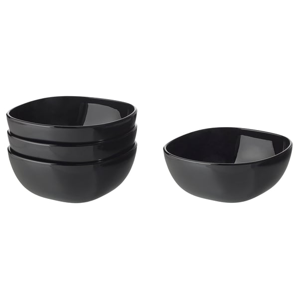 Two stacks of black bowls, glossy and square-shaped, made of tempered glass.
