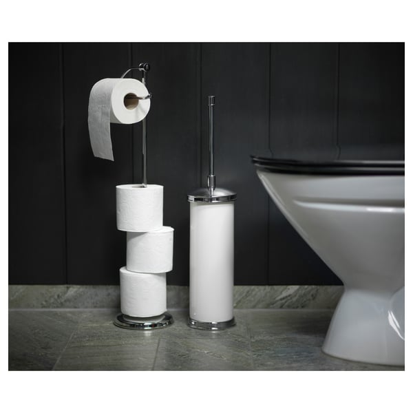Modern bathroom with chrome BALUNGEN 3-roll toilet paper holder and matching brush.