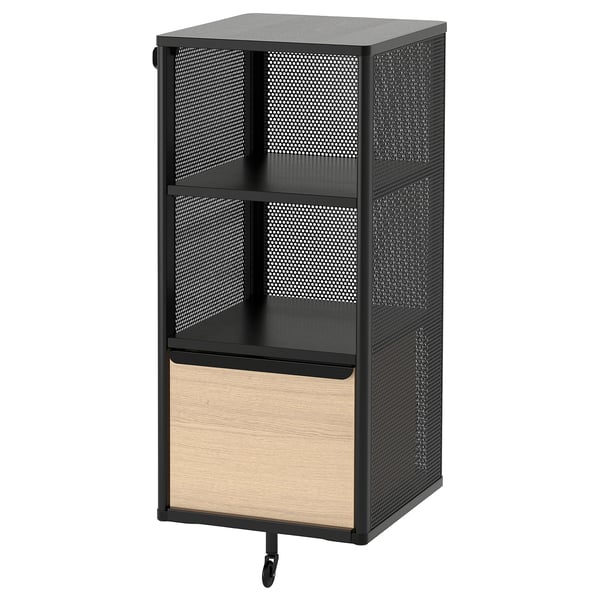 An IKEA BEKANT storage unit, black with wooden drawers, featuring multiple shelves and a mesh design.