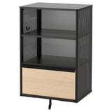 Black BEKANT storage unit with wooden drawer, mesh design.
