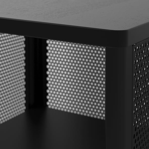 Black modern desk with perforated steel side panels, showing quality craftsmanship and durable materials.