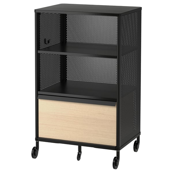 Modern black metal storage unit with wooden drawer, wheels, and perforated sides for ventilation.