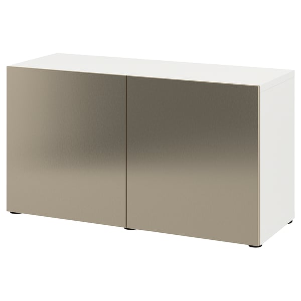 White BESTÅ storage unit with brushed gold doors, sleek and modern design.