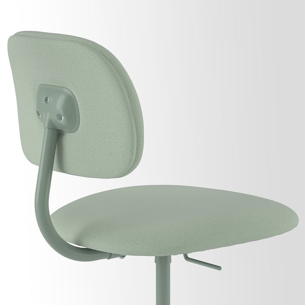 Modern ergonomic chair; light green seat & back, sturdy metal frame, swivel & height adjustable.