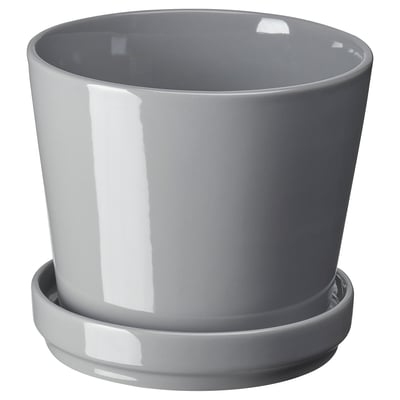 Grey and white stoneware planter with saucer, simple, rounded design.