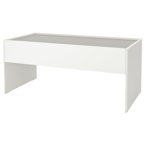 A white DUNDRA childrens activity table with a rectangular shape and smooth design. It a large, flat top and a central drawer for storage.