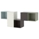 Modern wall-mounted storage system. Four cubes in light blue, white, grey, and green. Made from particleboard and metal. Unique, colourful design.