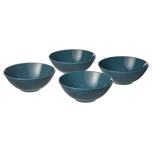 Four dark blue FÄRGKLAR stoneware bowls, identical in design, arranged in a square formation.