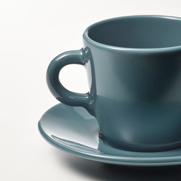 Teal stoneware cup & saucer set. Glossy finish, large handle.