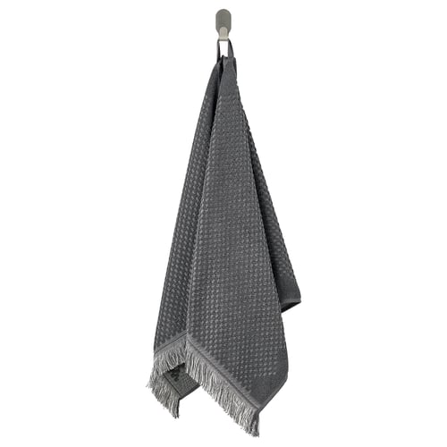 Grey FJÄLLSTARR cotton towel with intricate texture and fringe.