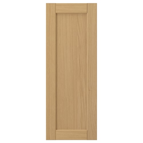 Forsbäcka light oak wooden door, rectangular with bevelled edges.