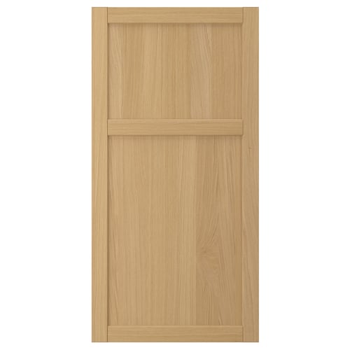 A FORSBACKA wooden cabinet door in natural oak with a classic frame design.
