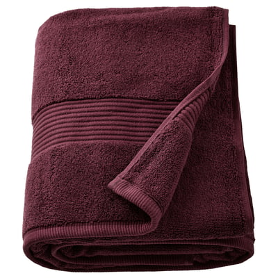 Red FREDRIKSJÖN bath towel folded, 100% cotton, thick, textured border.