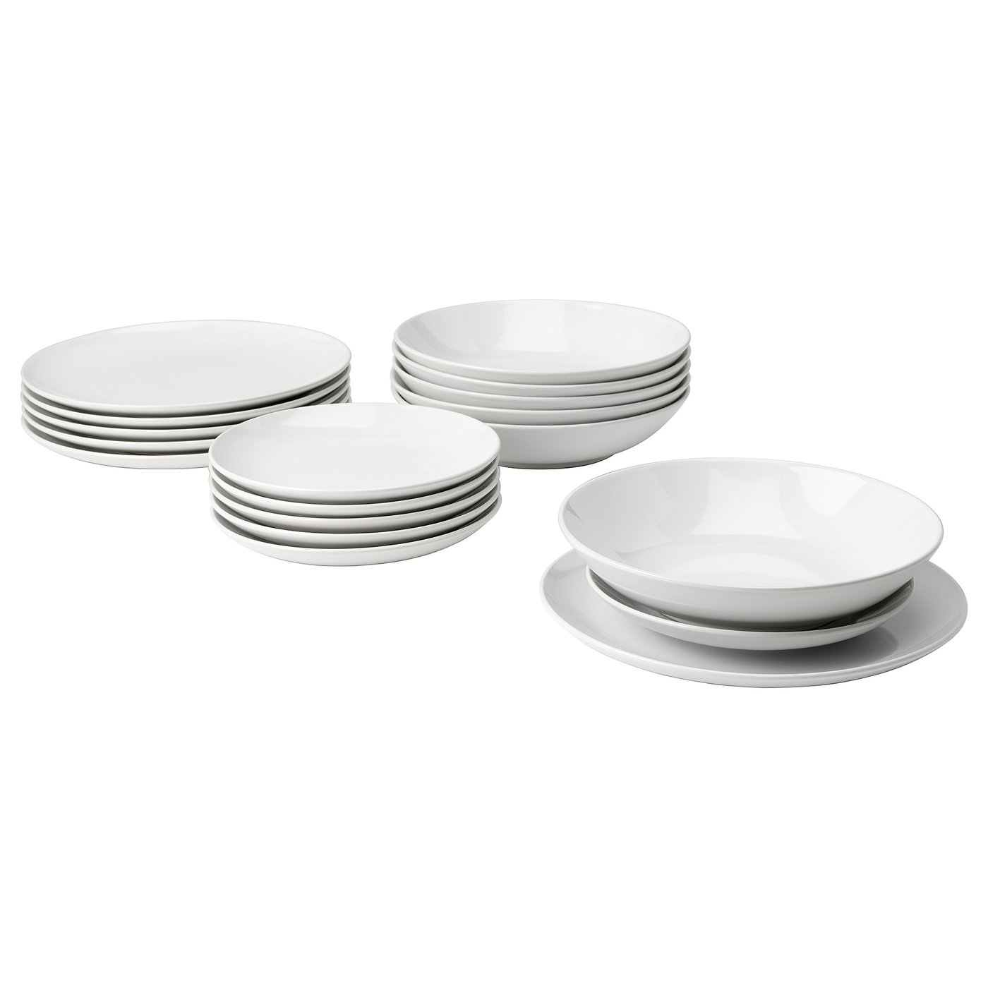 Set of white stoneware plates and bowls, simple and stylish design for everyday use.
