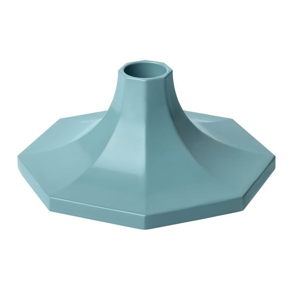 Octagonal blue candlestick holder made of aluminium. Modern and sleek design, perfect for festive table settings.