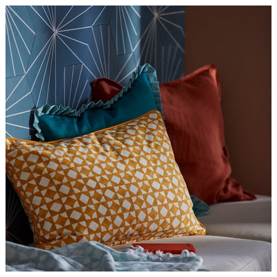 Vibrant yellow and white geometric throw pillow with mosaic design, soft cotton, and subtle piping.