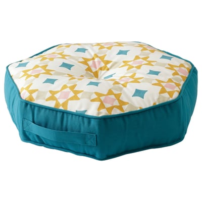Octagonal floor cushion with yellow star pattern, blue sides. Soft cotton, recycled polyester filling.