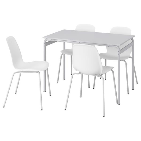 White GRÅSALA dining set with rectangular table and four chairs. Modern, space-saving design with metal table frame and plastic chairs.