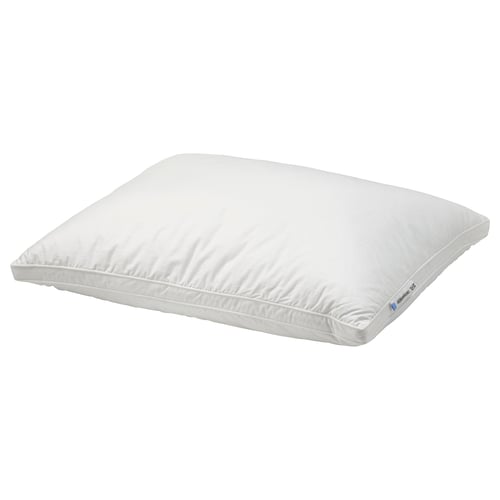 A white grönamarkt pillow with a supportive core, fluffy outer filling, and double piping. It is square-shaped and made of cotton.