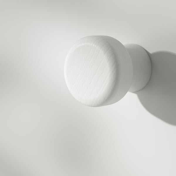 Axis of white spherical lights casts distinct shadows, showcasing precise design and polished finish.