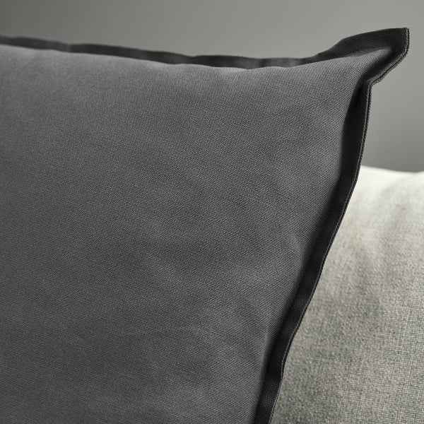 Dark grey cushion cover with smooth texture and neat stitching. Hidden zip closure.