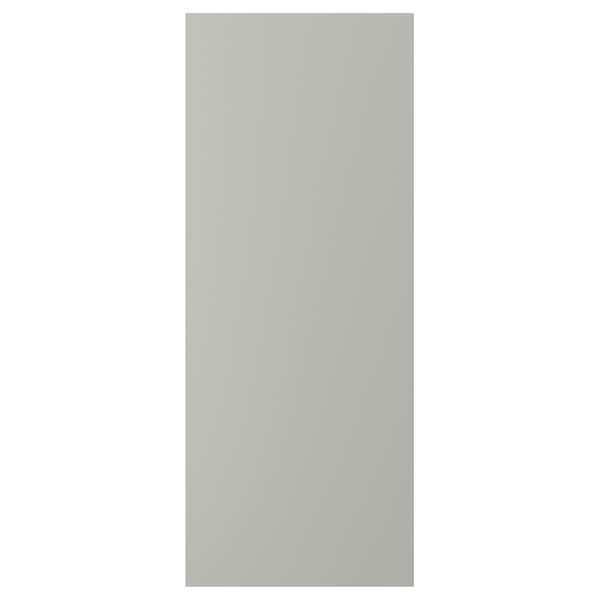 A light grey HAVSTORP kitchen cabinet door with a smooth, rectangular design made from acrylic paint and fibreboard.