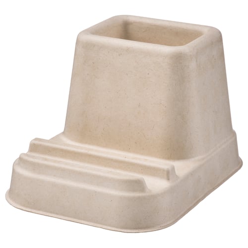 A beige HÖNSNÄT organiser, made of moulded paper pulp, designed to hold pens or a phone on a table.