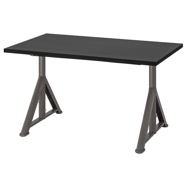 An IDÅSEN black desk with a rectangular top and metal legs in a trestle design, suitable for various uses.