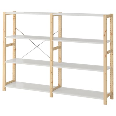 An IVAR storage unit in white with wooden posts. It four shelves and a sturdy design.