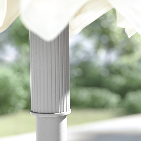 Modern white aluminium patio parasol, ribs visible, set against green background.