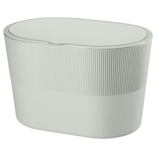KINNASJÖ: oval, light green, recycled plastic waste bin with ribbed design and lid.