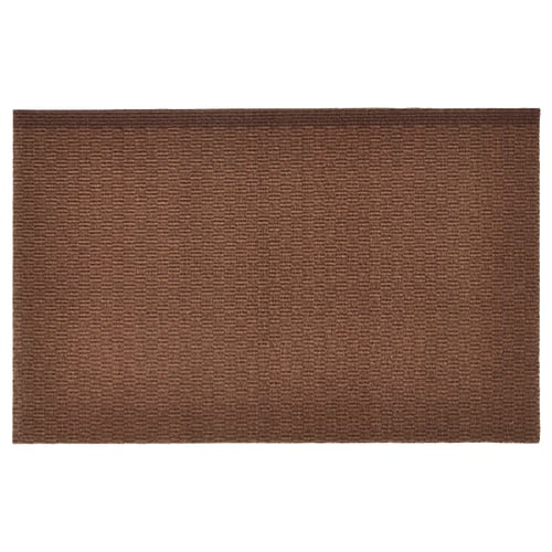 Brown rectangular woven doormat with a textured pattern. Made from recycled polyester for durability.