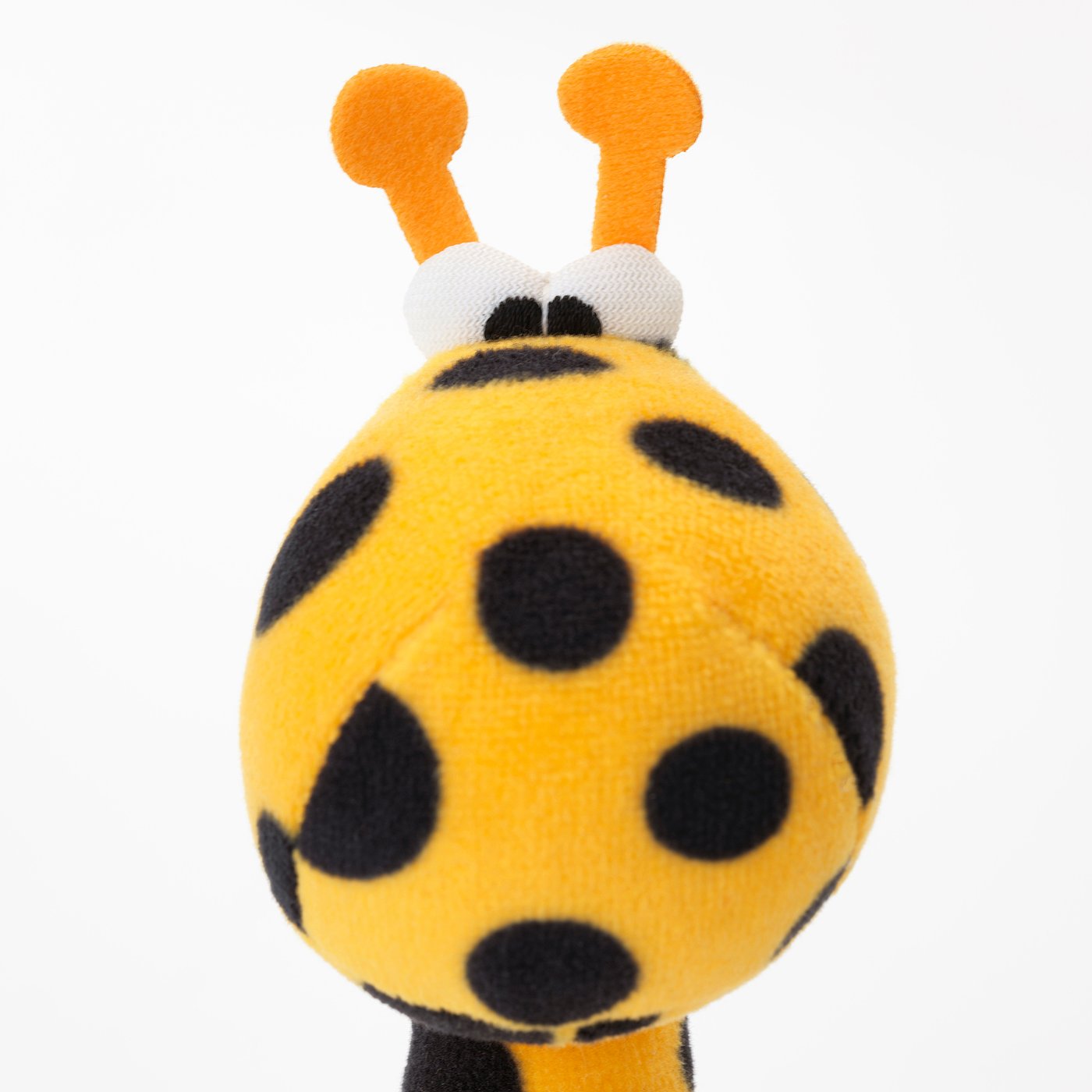 Plush giraffe toy with bright spots and friendly ; high-quality, soft materials and safe for play.
