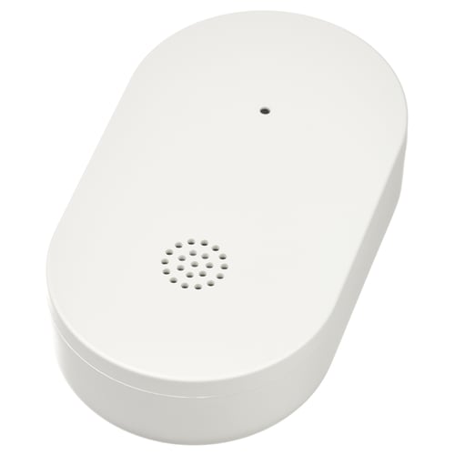 A white KLIPPBOK water leak sensor. Its oval-shaped with a speaker grille, designed to detect water leaks and alert users.