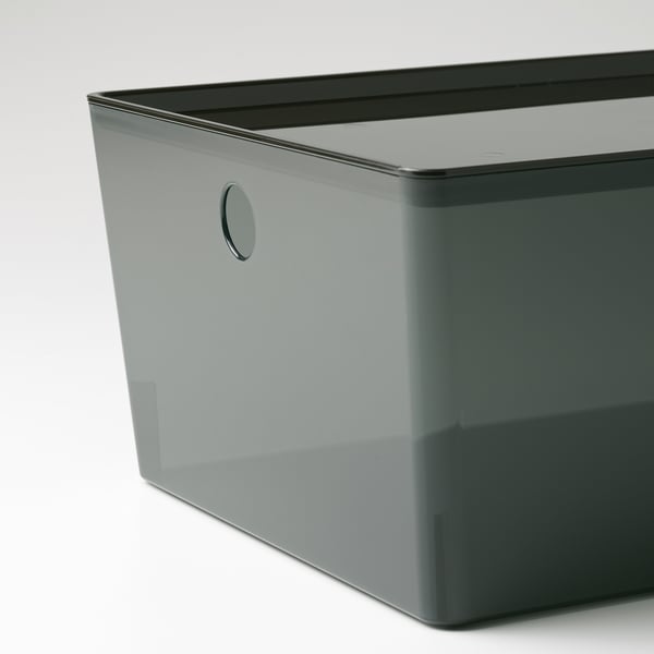 A rectangular, grey storage box with a lid and a circular handle on the side. The box appears durable and suitable for organising various items.
