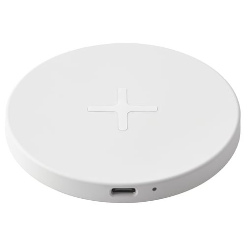 LIVBOJ white circular wireless charging pad, slim, round, white, usb-c input, silicone feet, minimalist design.