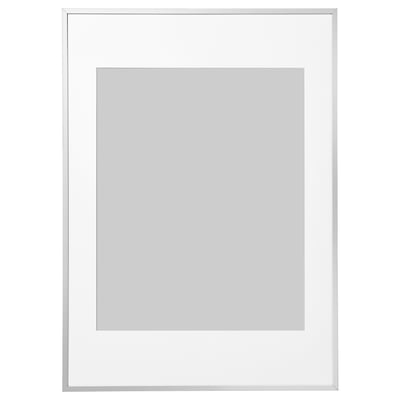 Silver LOMVIKEN picture frame with thin metal edge, square shape, and plastic front protection.