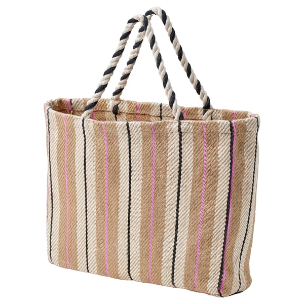 Handwoven tan and white striped tote bag with pink and black accents, braided handles, durable jute and cotton construction.