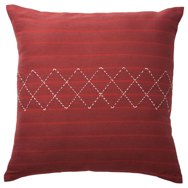 Red MÄVINN cushion with striped pattern and embroidered diamonds. Square shape. Cotton material.