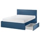Blue MALM bed with white mattress and open storage drawers.