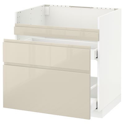 White and beige modern kitchen cabinet set, featuring high gloss doors and sleek design.