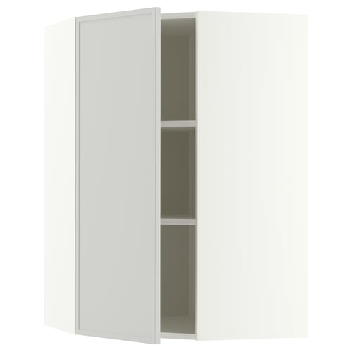White METOD wall cabinet with adjustable shelf, reversible door.