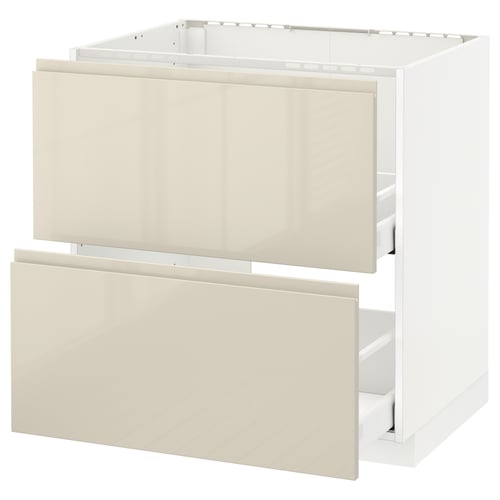 METOD kitchen section with cream drawers and white base, high gloss finish.
