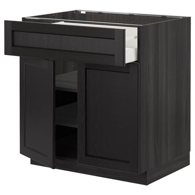 Black METOD kitchen unit, dark wood finish, square shape with open drawer and cabinet.