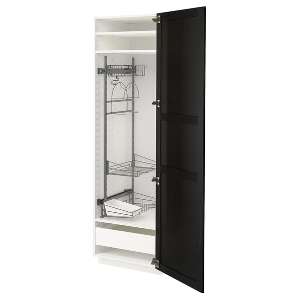 Black and white METOD closet with multiple storage shelves and hanging rod.