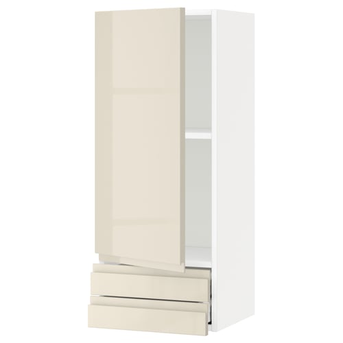 METOD kitchen cabinet in glossy beige with handle-less doors and bottom drawer.