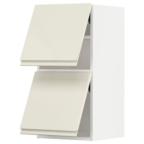 Modern off-white kitchen cabinets in glossy beige with sleek handles, angled open.