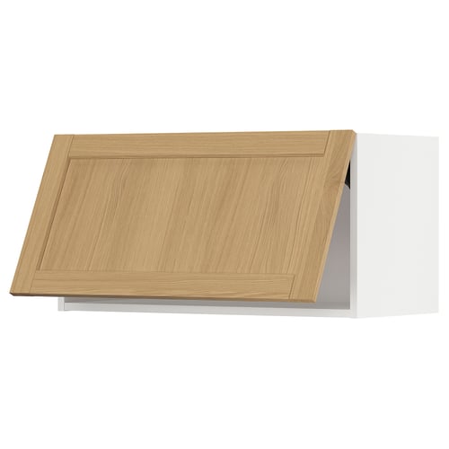 Light wood cabinet door with bevelled edges.