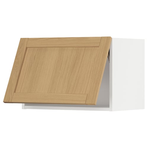 Light wood cabinet door, flat panel design with slightly bevelled edges.
